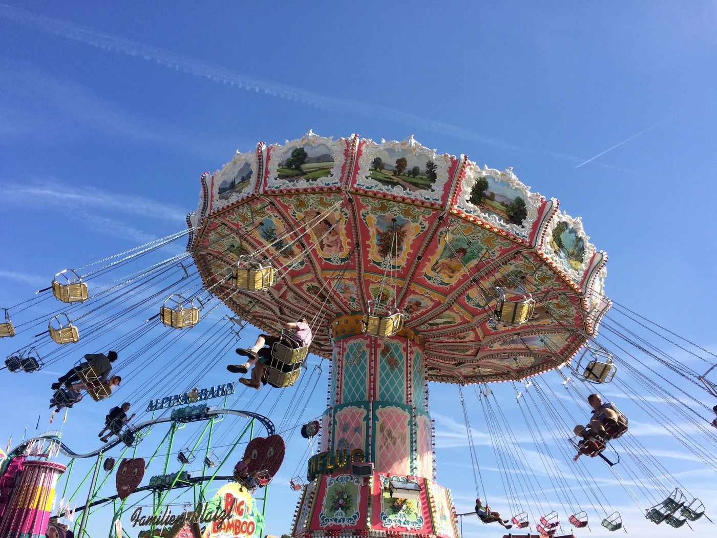 Not to be missed: events in Königsbrunn Swing ride carousel at fairground under clear blue sky