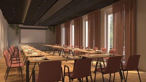 Conference room with wooden chairs, tables, newspapers, and windows with curtains