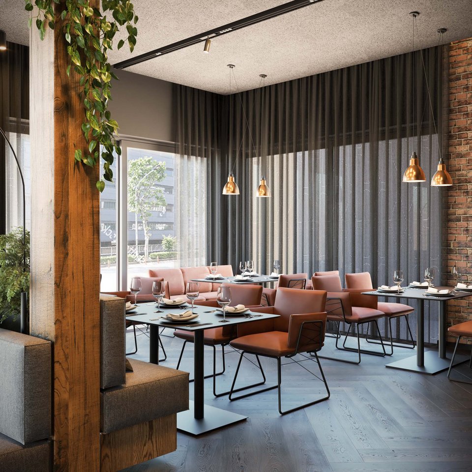 Modern restaurant with brown chairs, black tables, and green plants